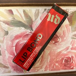 Urban Decay lip bond. Color unbreakable power red.